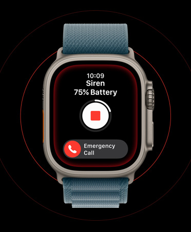 Apple Watch Ultra 3 med urkasse i farven naturligt titanium, aktiveret sirene, stopknap og knap til nødopkald på skærmen og Alpine Loop-rem i stålblå