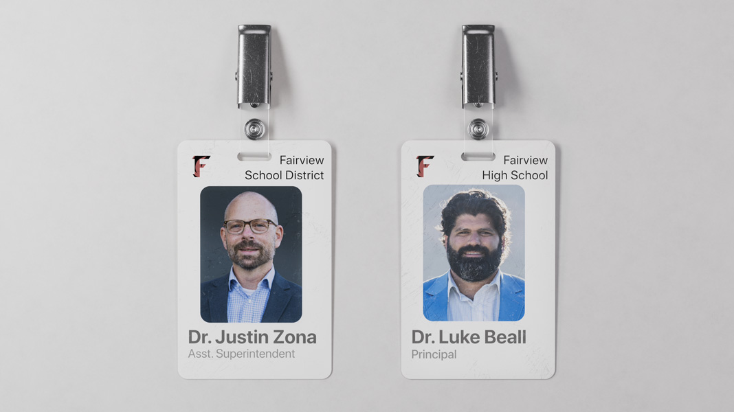 Dois cartões de identificação de professores do Fairview School District lado a lado: Dr. Justin Zona à esquerda e Dr. Luke Beall à direita